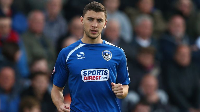 Cheltenham Secures Wilson on Short-Term Defensive Deal